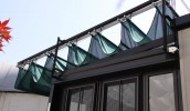サンルーム上部の開閉式テントにe-shadeを採用